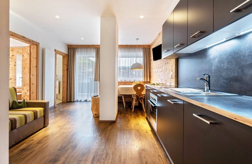 Gudon Apartment | Superior Holiday Apartment 'Marialisa Apt Orchidee' with Mountain View, Whirlpool & Wi-Fi