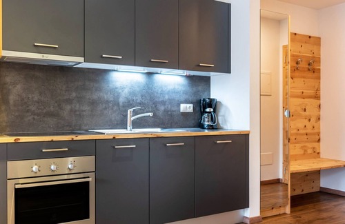 Gudon Apartment | Superior Holiday Apartment 'Marialisa Apt Orchidee' with Mountain View, Whirlpool & Wi-Fi