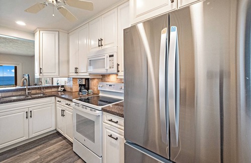 Historic Lahaina Front Street House | Superior, remodeled, Oceanfront two bedroom 2.5 bath low rise, AC, pool.