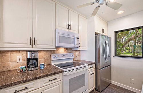 Historic Lahaina Front Street House | Superior, remodeled, Oceanfront two bedroom 2.5 bath low rise, AC, pool.