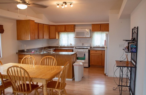 Edgerton House | Sweet beach front on Lake Koshkonong w/lots of room & a Paddleboat