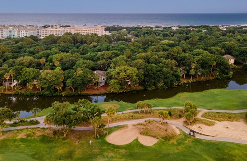 Marsh Island House | Sweet Tea by AvantStay | Waterside Sanctuary w/ Screened Porch & Deck Views