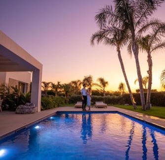 Tingaki Hotel | TAF Villas Beach Resort with Tesla