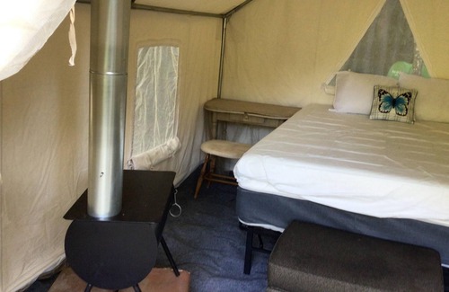 Turtletown RV Rental | Tentrr Signature Site - Wine Drops Creekside Camping #2 / McFarland Nights