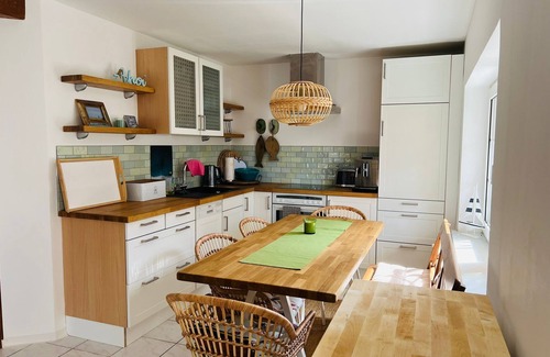 Stahlbrode House | Thatched-roof holiday home with water view, garden and fireplace