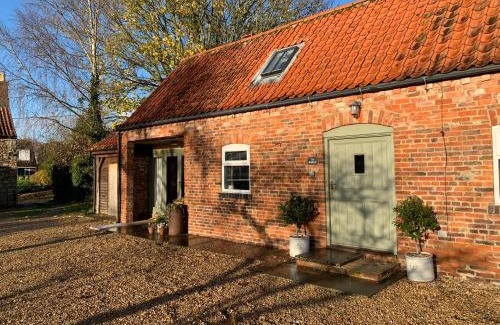 Glentham House | The Bolthole barn with wood-fired hot tub