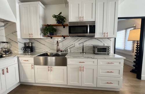 Downtown Riverside House | The Charming House of Riverside: All King beds, 55" Smart TVs, W/D, Downtown