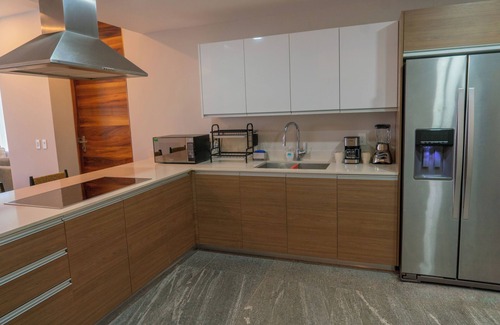 Zona Hotelera Apartment | The Double View - Lavish Ocean View Condo