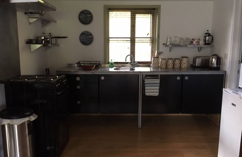 Somerton House | The Garden Room. Timber framed, light and airy accommodation with veranda.