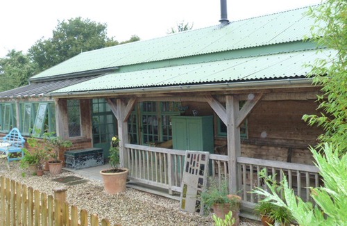 Somerton House | The Garden Room. Timber framed, light and airy accommodation with veranda.