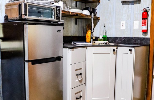 Marble Falls House | The LOVE Shack Shipping Container Tiny Home in the woods near the BNR park