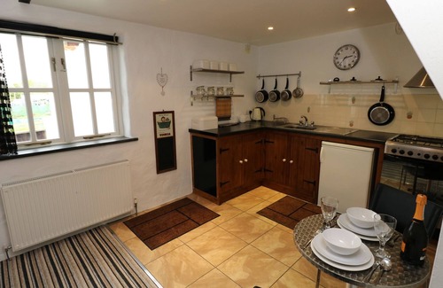 Fishguard Cottage | THE OLD STABLES, romantic, character holiday cottage in Fishguard