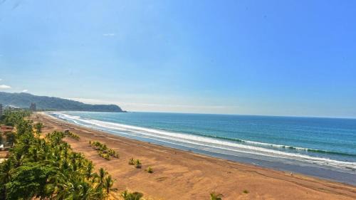 Barrio Los Villalobos Apartment | The Palms Jaco 1001 penthouse on the beach