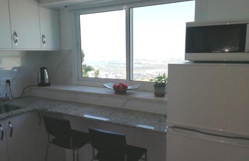 Haifa Apartment | The Potter's House overlooking the Bay of Haifa