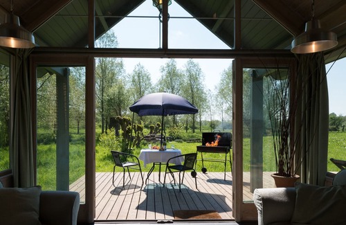 Stoke by Nayland House | The Pump House, impressive style, in a meadow, by a bubbling brook, unique