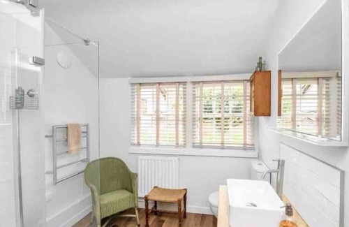 Hawstead Cabin | The Red Shed sleeps 2 private garden and parking 3 miles from Bury St Edmunds