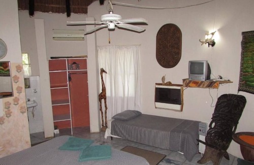 Thorny Bush Game Reserve House | The revamped riverside Kruger Park Type rondawel with Kitchen and Satellite TV