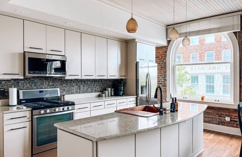 Downtown Greensboro Apartment | The Rooftop Nest - Downtown, Pet Friendly, Laundry, Natural Light