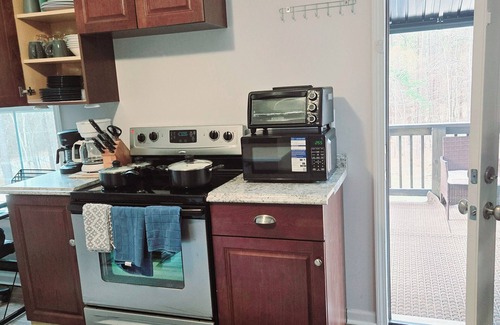 Greensboro Apartment | The spacious loft apartment 3/2 kingbed with stairs, pool and Grill sleeps 7.
