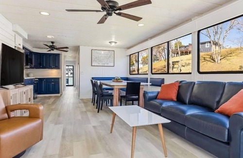 Allons Boat Rental | The Stillwater Houseboat 75' - Medium Houseboat, 6 bedrooms,waterslide, fireplace on rooftop lounge area