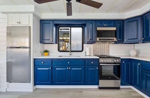 Allons Boat Rental | The Stillwater Houseboat 75' - Medium Houseboat, 6 bedrooms,waterslide, fireplace on rooftop lounge area