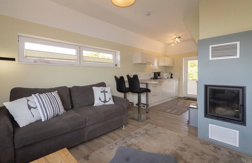 Hornum House | The thatched clinker house is located in the dunes of Hörnum