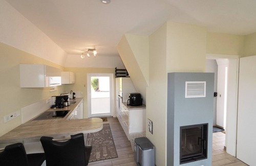 Hornum House | The thatched clinker house is located in the dunes of Hörnum