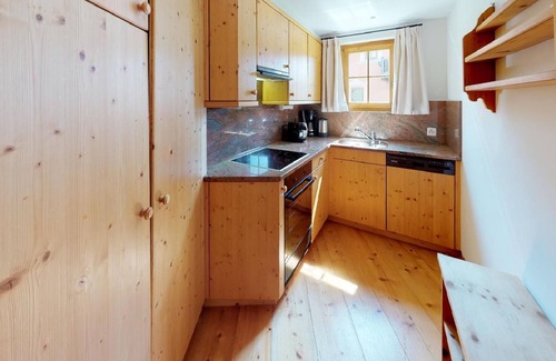 Celerina-Schlarigna Apartment | The traditional Chesa Marmotta is situated next to the famous River "Inn" in a v