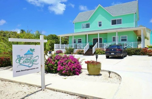Colliers Bay Condo | The Tropical Breeze Oceanfront Studio Cottage in East End