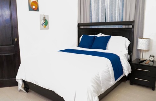 Juan Dolio Bed & Breakfast | The white rock villa this 9 bedroom 9 bathroom offer fee continental breakfast