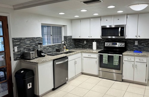 New Port Richey East House | This cozy house comes with 3 bedrooms, 2 baths and a private swimming pool.