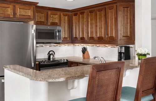 Palm Beach Resort | This discounted two-bedroom provides the perfect respite for the whole family.