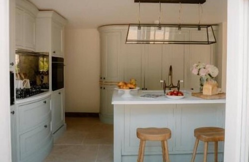 Bunbury House | This historic building offers an inviting retreat with its charming blend of comfort and elegance.