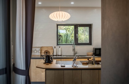 Andeok House | This is a modern design space, and you can enjoy outdoor bath facilities