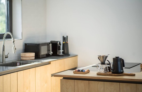 Andeok House | This is a modern design space, and you can enjoy outdoor bath facilities