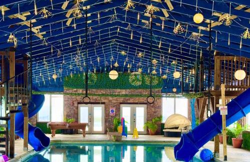 Bryant House | This is IT Cabin with a hot tub fire pit & indoor pool