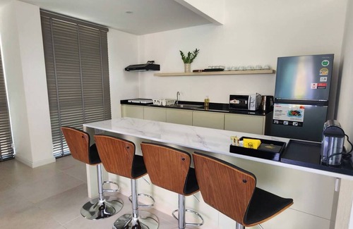 Na Kluea Villa | This premium villa, situated just 200 meters from the coast and convenience.n
