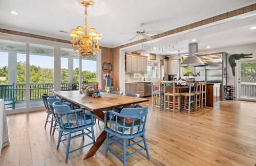 Debordieu Colony House | This vibrant family home features 8 bedrooms, and 8 bathrooms, ocean and creek views