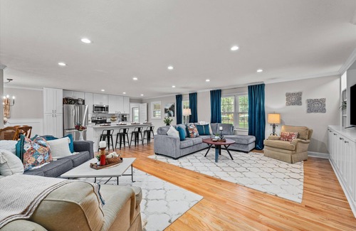 Martinez House | Three bedroom two bath with fenced yard and 2 car garage. The sleeping arrangements for this property are 3 queen beds.