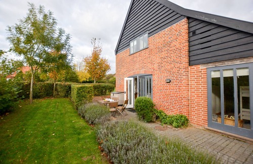 Orford Cottage | THREE CHANTRY BARNS, ORFORD, pet friendly, with a garden in Orford
