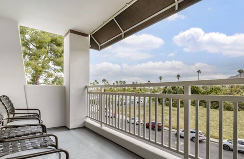 Canyon Corridor Resort | Three Spacious 2BR Suite w/ Balcony | Kitchen + Living Area | 2 Swimming Pools