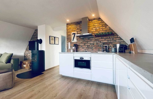 Wittduen Apartment | TIDE4 Amrum No. 7 - Modern apartment with wood-burning stove. 100m to the sea. Dogs welcome!