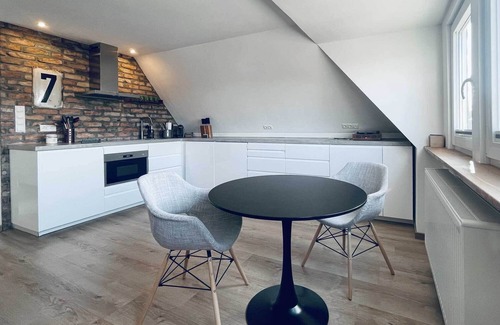 Wittduen Apartment | TIDE4 Amrum No. 7 - Modern apartment with wood-burning stove. 100m to the sea. Dogs welcome!