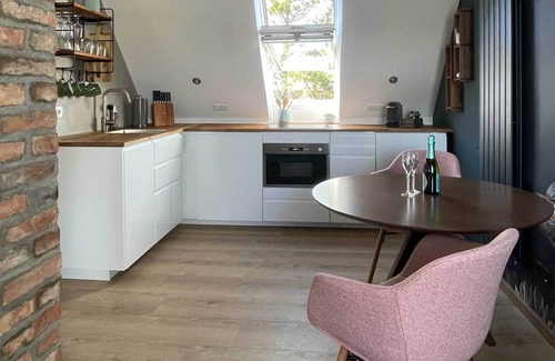 Wittduen Apartment | TIDE4 Amrum No. 6 - Modern apartment with fireplace 100m to the sea, dogs welcome