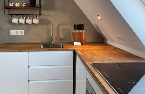 Wittduen Apartment | TIDE4 Amrum No. 6 - Modern apartment with fireplace 100m to the sea, dogs welcome