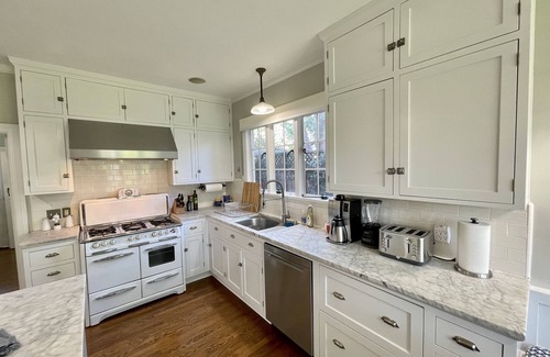 San Jose House | Timeless Tudor With Game Rooms & Hot Tub!