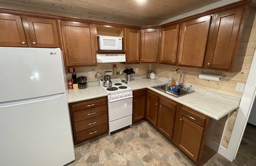 New Pekin House | Tiny home with a cabin feel