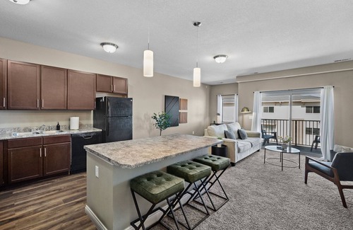 West Des Moines Apartment | Top Floor! Garage Included + New Onsite Gym!