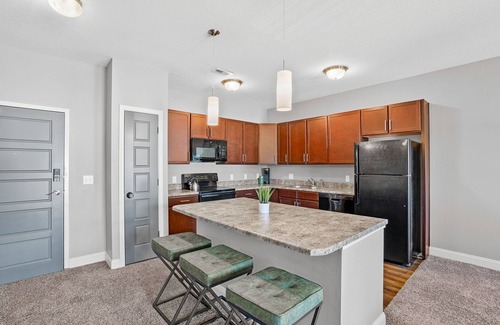 West Des Moines Apartment | Top Floor! Garage Included + New Onsite Gym!