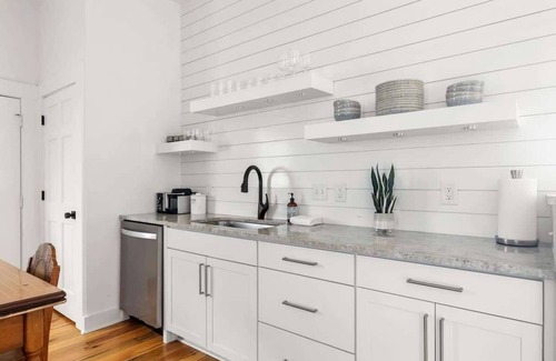 South of Broad Apartment | Top Floor & Lake Views! Stylish 2BR Downtown Condo